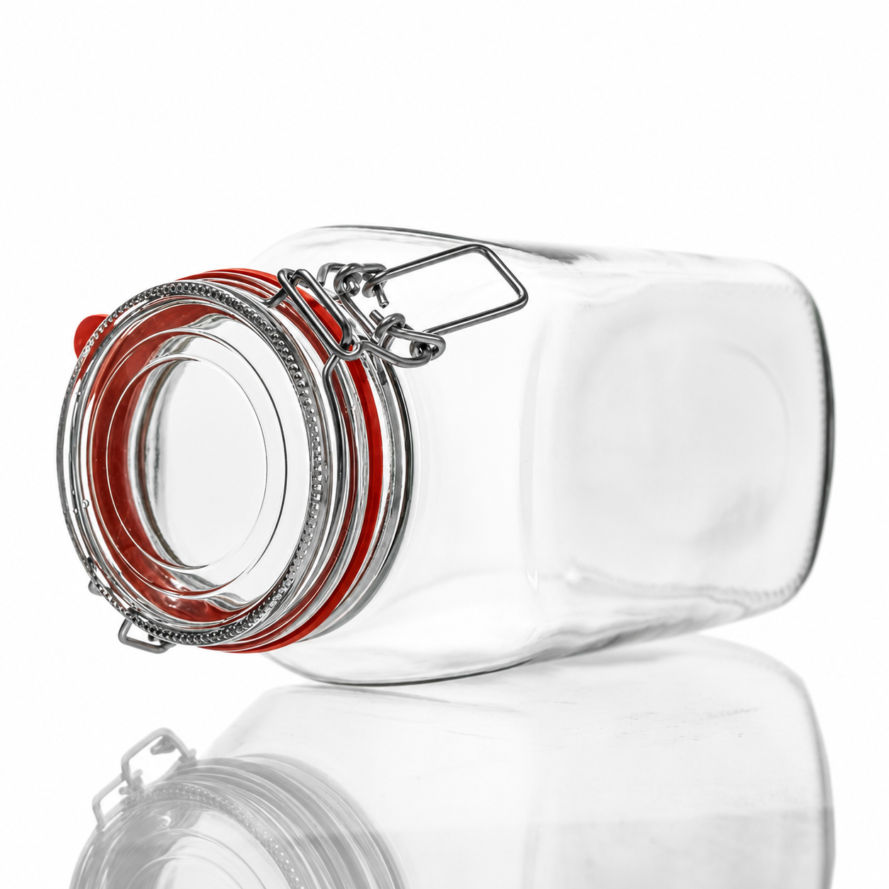 Liegendes eckiges Drahtbügelglas aus Klarglas mit Glasdeckel, rotem Gummiring und deutlich sichtbarem Metallbügelverschluss
