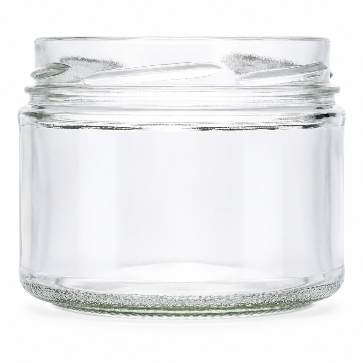 Klares Konservenglas 540 ml mit breiter TO-100-Mündung, niedriger Rundform und strukturiertem Glasboden auf weißem Hintergrund.