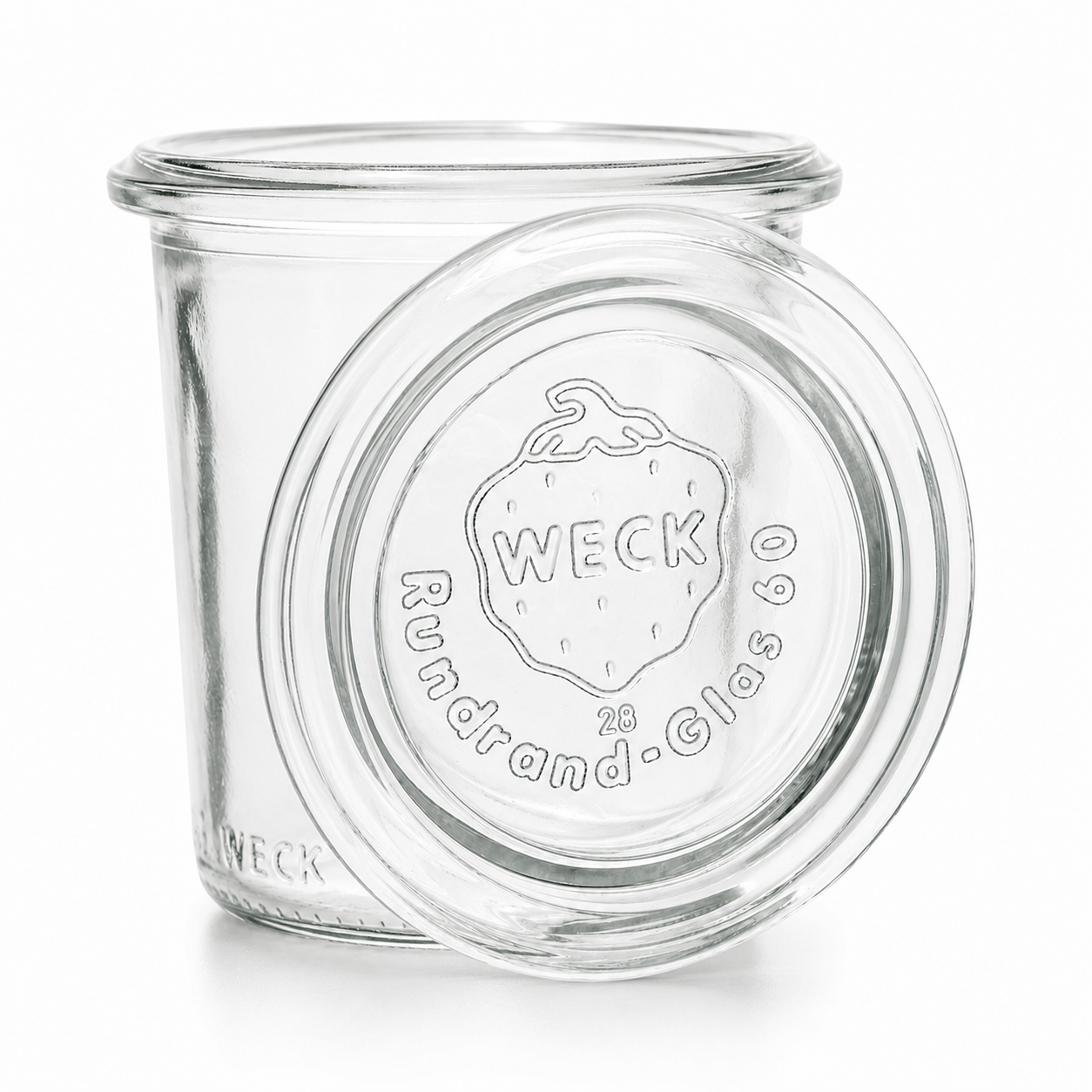 WECK-Mini-Sturzglas 140 ml RR60 aus Klarglas mit passendem Glasdeckel, Rundrandmündung und sichtbarer WECK-Prägung auf weißem Hintergrund.