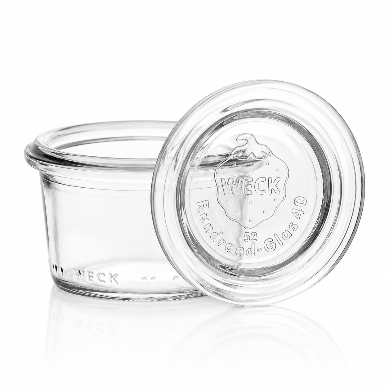 WECK-Mini-Sturzglas 35 ml RR40 aus klarem Glas mit angelehntem Glasdeckel und sichtbarer WECK-Prägung.
